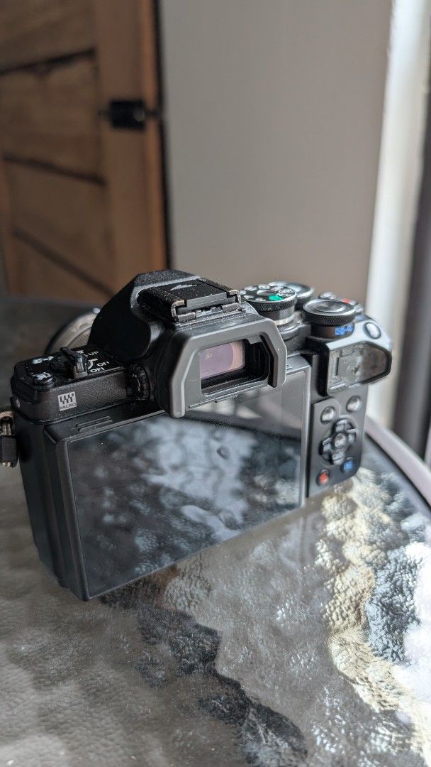 Olympus OM-D E-M10 Mark III Mirrorless Camera with Lens (Category: Cameras) located in Caloocan City. Submitted by nafanyadwa02005 (Listing ID 1467450864, Image 3). Description: Selling my pre-loved Olympus Micro Four Thirds setup. Technically in perfect working condition. Great for street photography, travel, and vlogging! Selling as a bundle, but open to selling separately. PRICES: • Bundle Price (Everything below): 34,000 PHP • Body Only: ₱200