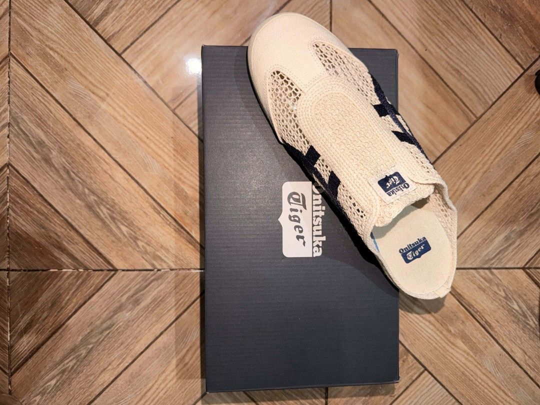 Onitsuka Tiger mexico 66 sabot (Category: Sneakers) located in Quezon City. Submitted by bizzyt (Listing ID 1467365723, Image 3). Description: -brought in japan -Rfs- wrong size -size 11 - Color: Cream with dark navy stripes - Design: Open heel, easy slide-in style - Condition: Clean, zero scuffs or dirt on the soles - Inclusions:Paper bag/ Original black Onitsuka Tiger shoe box.