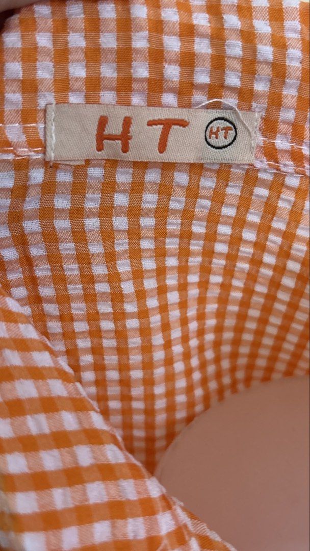 Orange Gingham Button Down Shirt Shorts Lounge Set HT (Category: Sets or Coordinates) located in Santa Cruz. Submitted by zellethrifts (Listing ID 1467388362, Image 2). Description: • Bought in Japan 🇯🇵 • Brand new / unused • Fits XS to small • In excellent condition • Photos taken using mannequin only 🚚 Shipping via J&T only 📦 Shipping fee to be shouldered by buyer 💳 Mode of payment: GCash 📍 Santa Cruz, Laguna.