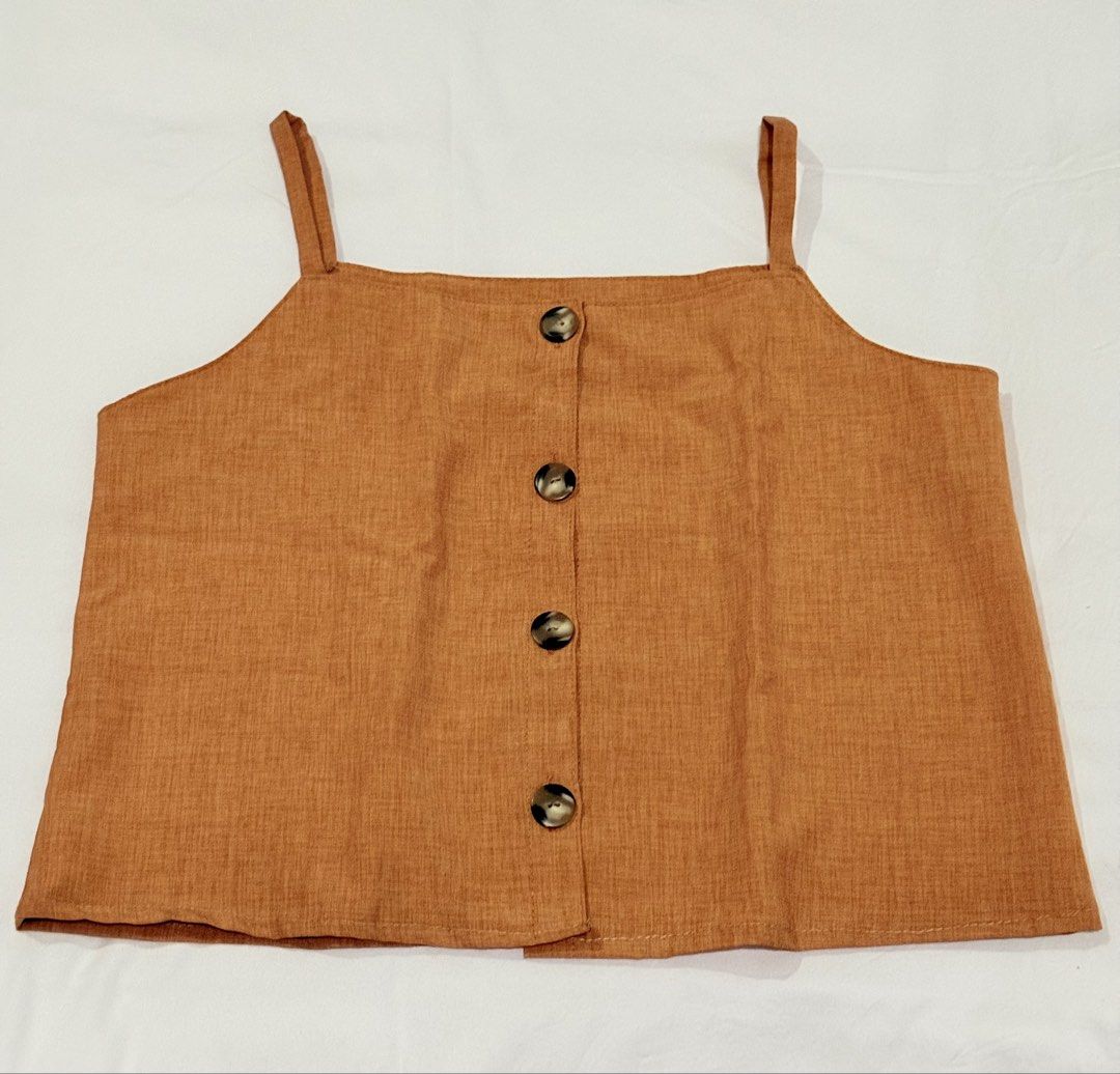 Orange Linen Square Neck Top (Category: Sleeveless) located in Pasig City. Submitted by mxvxt (Listing ID 1467463424, Image 1). Description: 〰 in good condition 〰 fits XS-S frame 〰 lightweight and breathable fabric 〰 cute & dainty european summer top! 〰 rfs: decluttering .