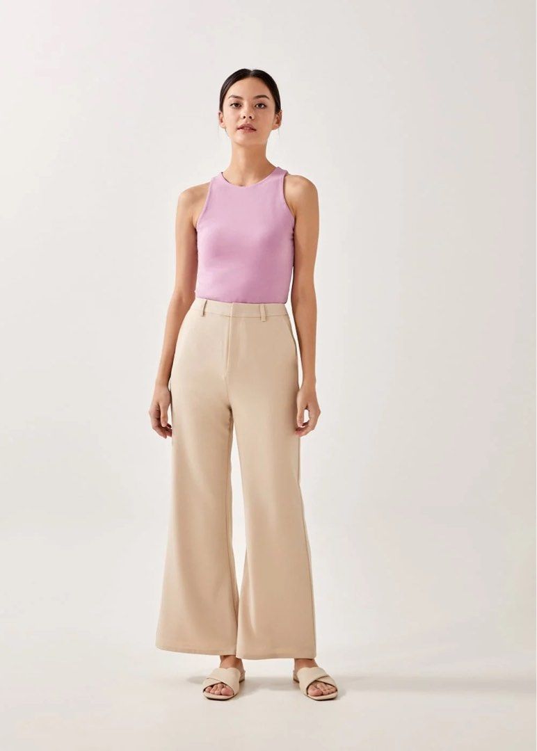 Orchid Round Neck Tank Top (Category: Sleeveless) located in Pasig City. Submitted by mxvxt (Listing ID 1467447967, Image 1). Description: 〰 in good condition 〰 fits S-M frame 〰 soft knit racerback tank top 〰 easy to match with high-waisted pants or skirts 〰 sold out on love, bonito website! 〰 rfs: decluttering .