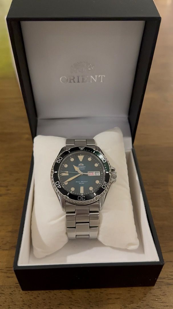Orient Kamasu 2 (Category: Men's Watches) located in Caloocan City. Submitted by alexandre12 (Listing ID 1467481851, Image 2). Description: For sale: Orient kamasu 2 green dial (RA-AA0811E19B). Caliber: F6922. 22 jewels Diameter: 42mm Water resistance: 200m Movement: Automatic with manual winding Inclusion: Complete set. With hangtag Power reserve: 40 hours Functions: Stop seconds hand function, day and date display Crystal: Sapphire Crystal. Fea