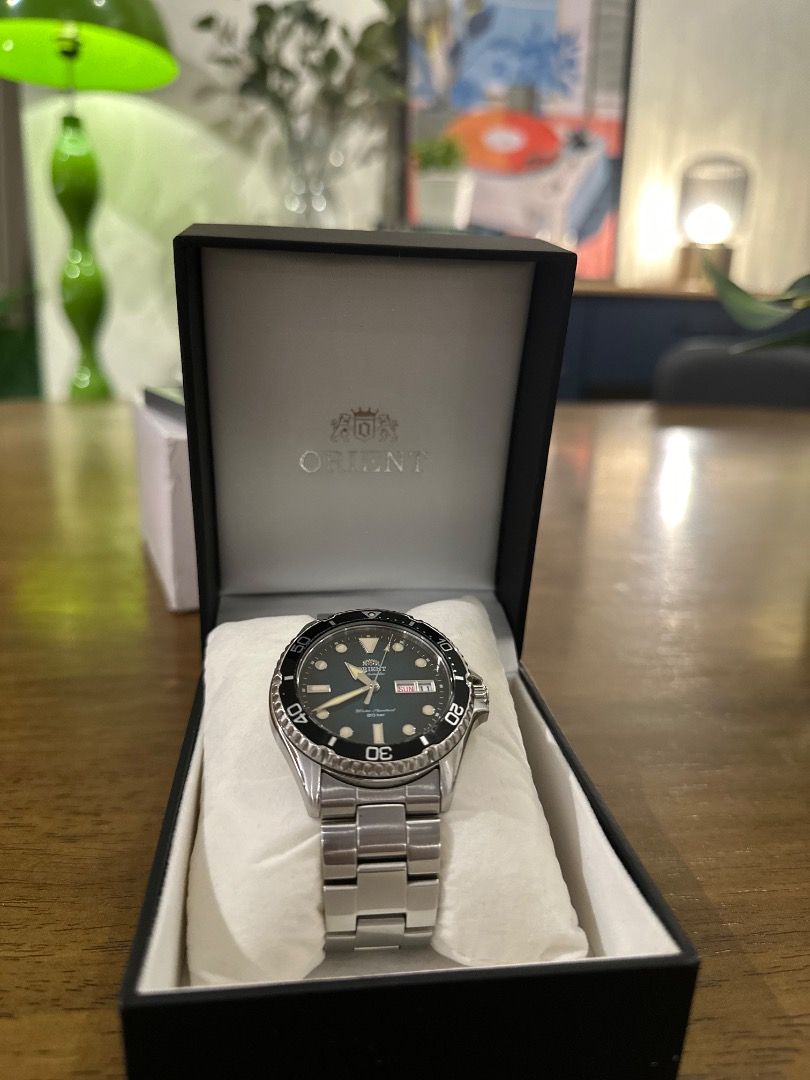 Orient Kamasu 2 (Category: Men's Watches) located in Caloocan City. Submitted by alexandre12 (Listing ID 1467481851, Image 3). Description: For sale: Orient kamasu 2 green dial (RA-AA0811E19B). Caliber: F6922. 22 jewels Diameter: 42mm Water resistance: 200m Movement: Automatic with manual winding Inclusion: Complete set. With hangtag Power reserve: 40 hours Functions: Stop seconds hand function, day and date display Crystal: Sapphire Crystal. Fea