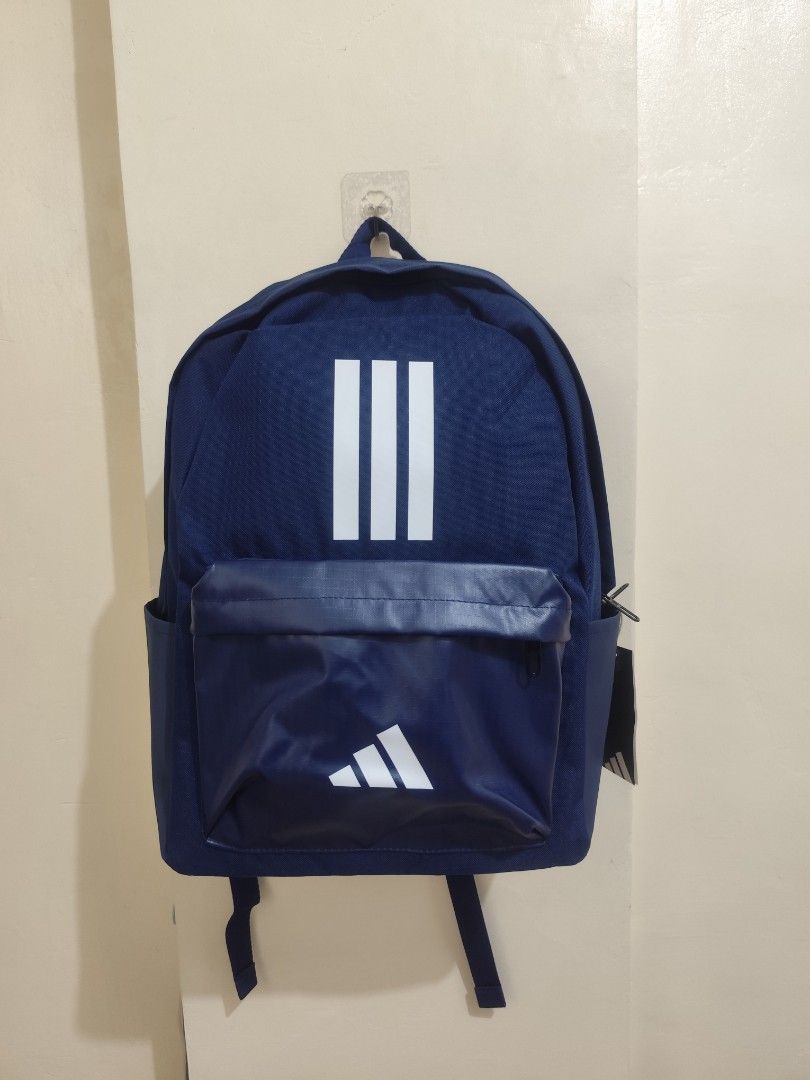 ORIG Adidas Dark Blue Backpack (Category: Backpacks) located in Manila. Submitted by deguzmanni82562 (Listing ID 1467526243, Image 1). Description: ORIGINAL ADIDAS BACKPACK BRANDNEW WITH TAGS MEET UP / PICK UP : LEVERIZA PASAY.