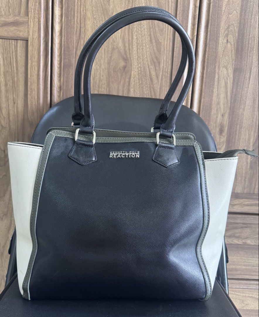 ORIGINAL - Kenneth Cole Reaction Satchel (Category: Tote Bags) located in Paranaque City. Submitted by happymommy2828 (Listing ID 1467403590, Image 2). Description: Original Kenneth Cole Reaction Satchel - Black center with army green trim and off-white side panels - Used twice and was only stored in the closet.