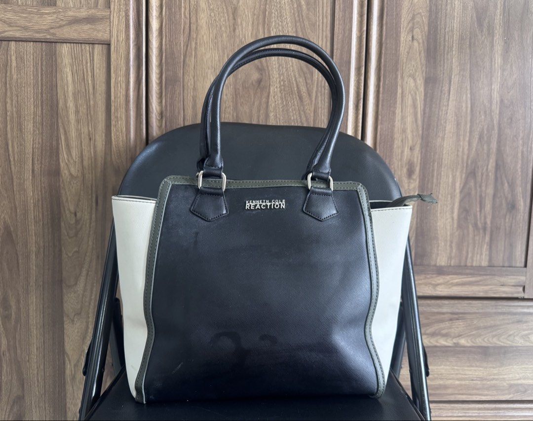 ORIGINAL - Kenneth Cole Reaction Satchel (Category: Tote Bags) located in Paranaque City. Submitted by happymommy2828 (Listing ID 1467403590, Image 1). Description: Original Kenneth Cole Reaction Satchel - Black center with army green trim and off-white side panels - Used twice and was only stored in the closet.