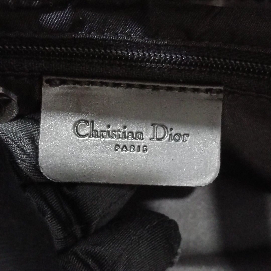 ORIGINAL CHRISTIAN DIOR BLACK NYLON SADDLE BAG (Category: Luxury Bags & Wallets) located in Manila. Submitted by fabluxury.corner (Listing ID 1467554866, Image 2). Description: Guaranteed original ✅ Rank A very good condition No functionality issue / no major flaws Professionally recolor on bag spa / no lagkit or sticky feel / not hard in texture/ looks nothing happen / so pretty in actual.