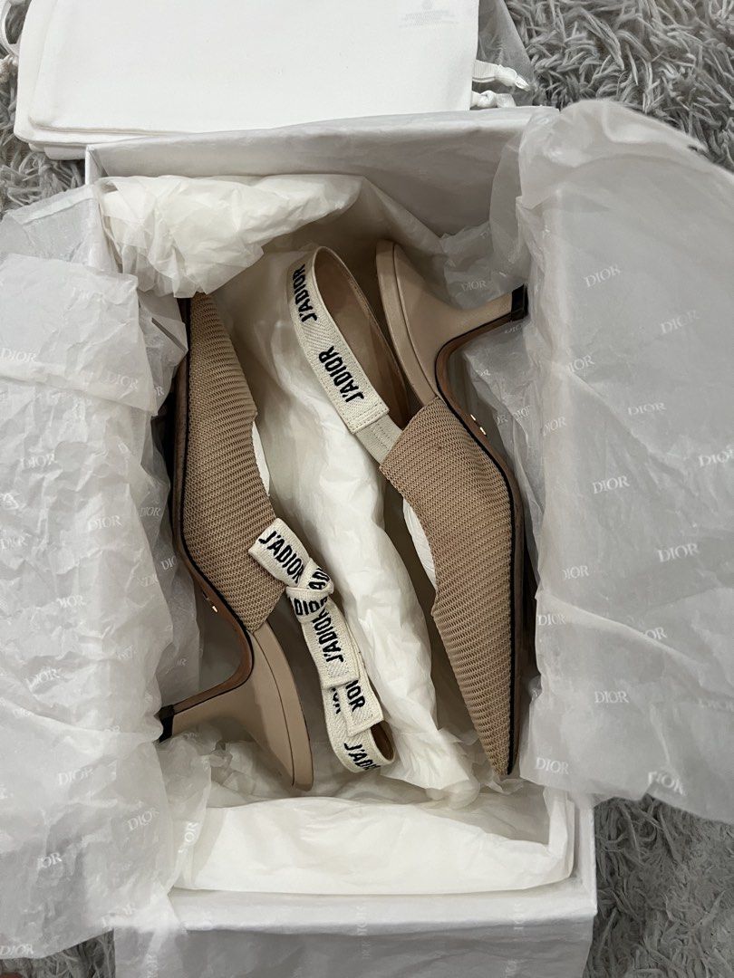 Original Christian Dior Kitty Heel (Category: Sneakers & Footwear) located in Quezon City. Submitted by tangled8 (Listing ID 1467418920, Image 3). Description: Original Christian Dior Kitty Heel size 5.5 fits size 6 color Powder Nude bought in Lotte Mall Korea..