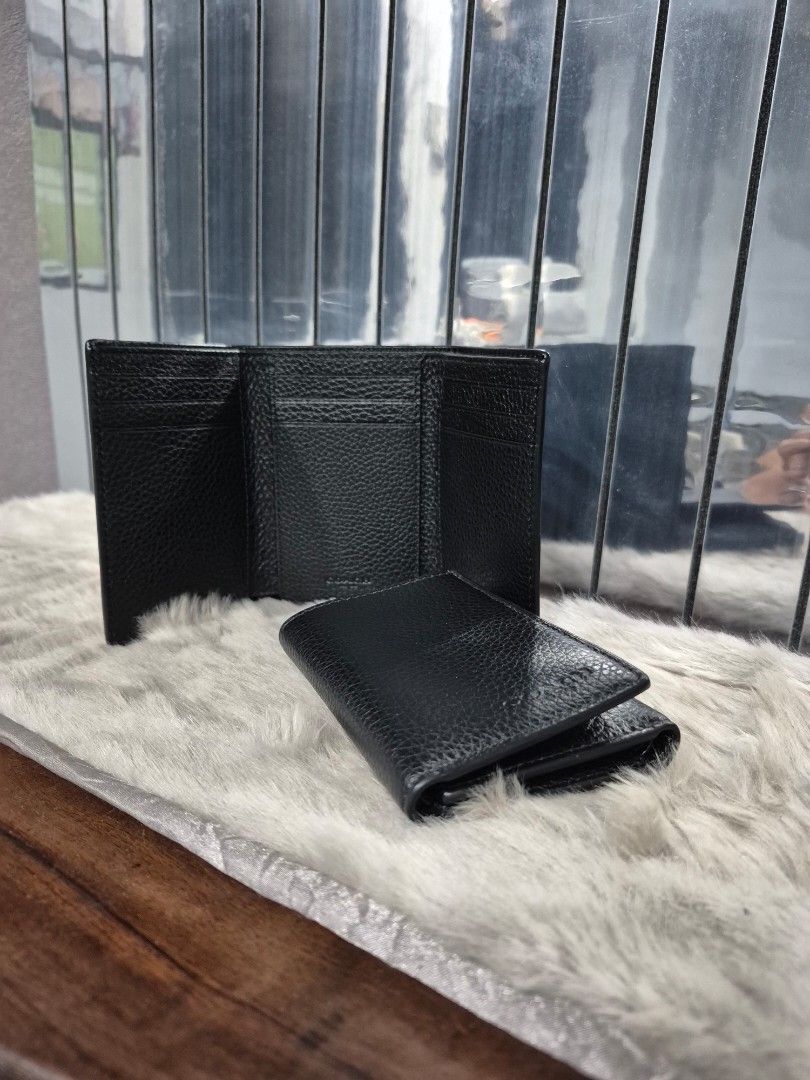 Original Coach Tri-Fold Wallet (Category: Wallets & Card Holders) located in Cavite. Submitted by chaellebrandsluxe (Listing ID 1467515711, Image 1). Description: selling low,no inclusions what you see is what you get.