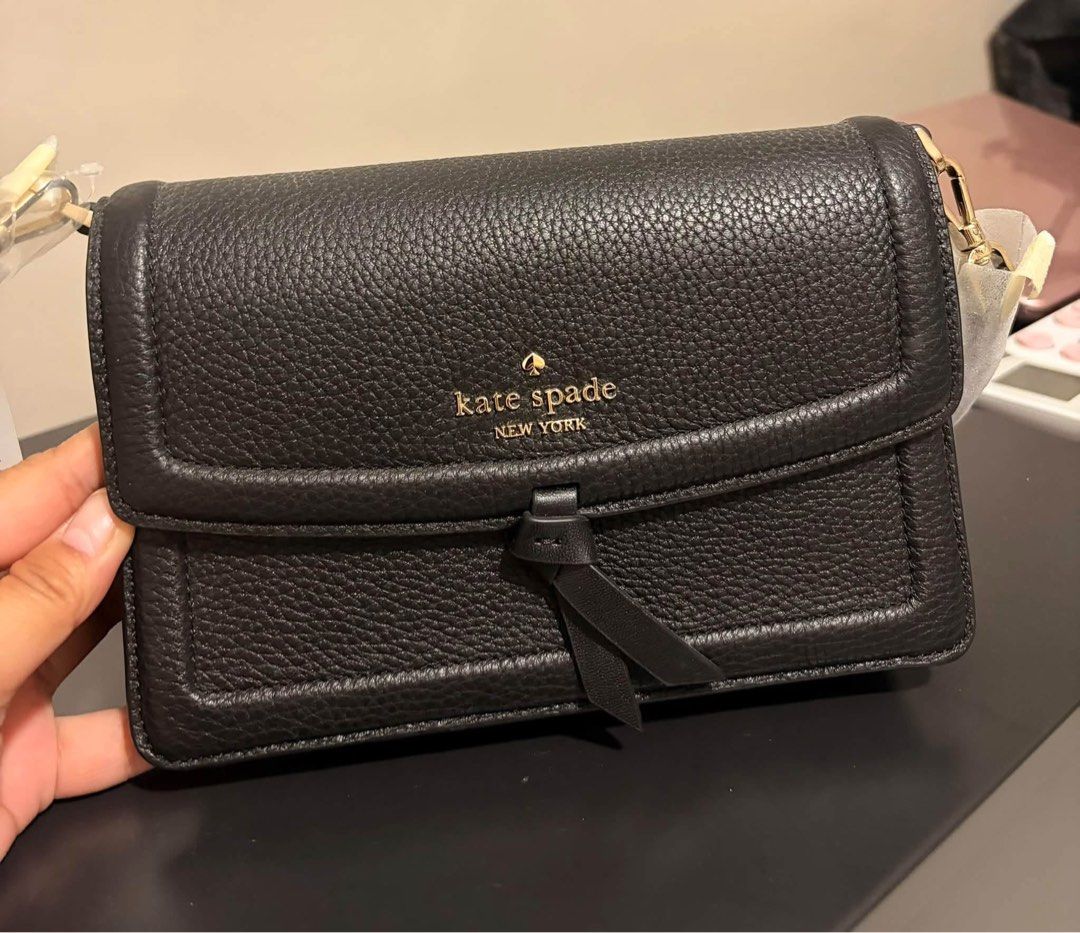 Original Kate Spade (Category: Luxury Bags & Wallets) located in Pasig City. Submitted by rmsoler (Listing ID 1467553475, Image 3). Description: Original Kate Spade Bag/Wallet NOTE: Please screenshot po ang iniinquire na item, since 4 po ang choices. Brandnew/Likenew Price: 4,000 Location: Bulacan Mode of payment: Bank/GCash.