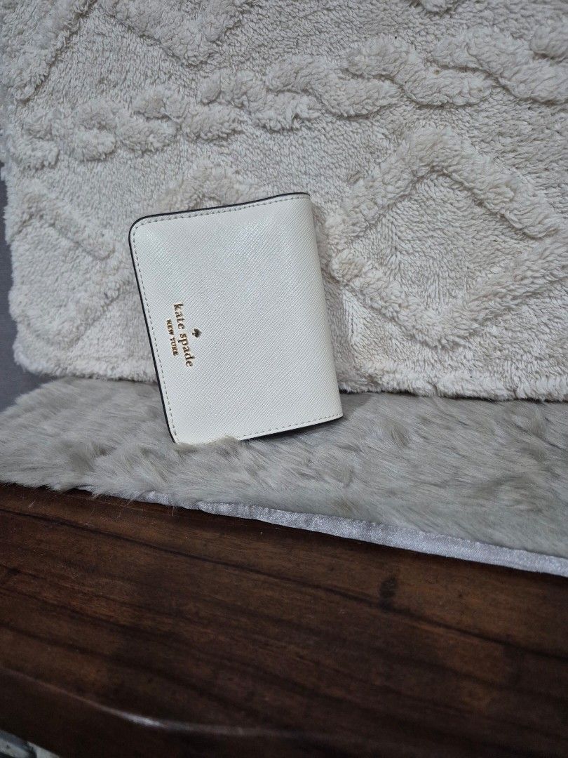 Original Kate Spade Bifold Wallet (Category: Wallets & Card holders) located in Cavite. Submitted by chaellebrandsluxe (Listing ID 1467475152, Image 2). Description: selling low, no inclusions what you see is what you get.