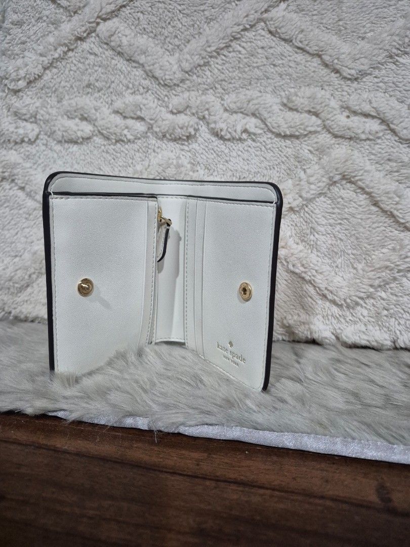 Original Kate Spade Bifold Wallet (Category: Wallets & Card holders) located in Cavite. Submitted by chaellebrandsluxe (Listing ID 1467475152, Image 3). Description: selling low, no inclusions what you see is what you get.