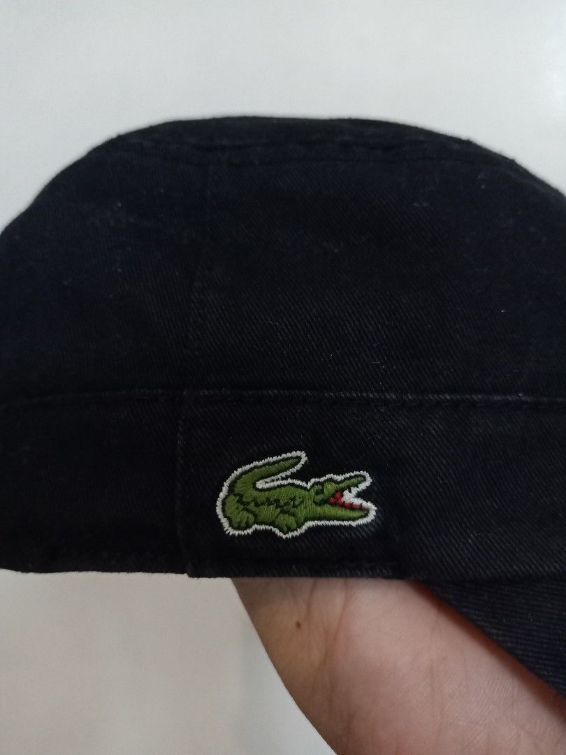 Original lacoste black cap (Category: Caps & Hats) located in Binmaley. Submitted by fashionluxury058 (Listing ID 1467365427, Image 2). Description: original lacoste black cap in very good condition size: free size adjustable unisex color black.