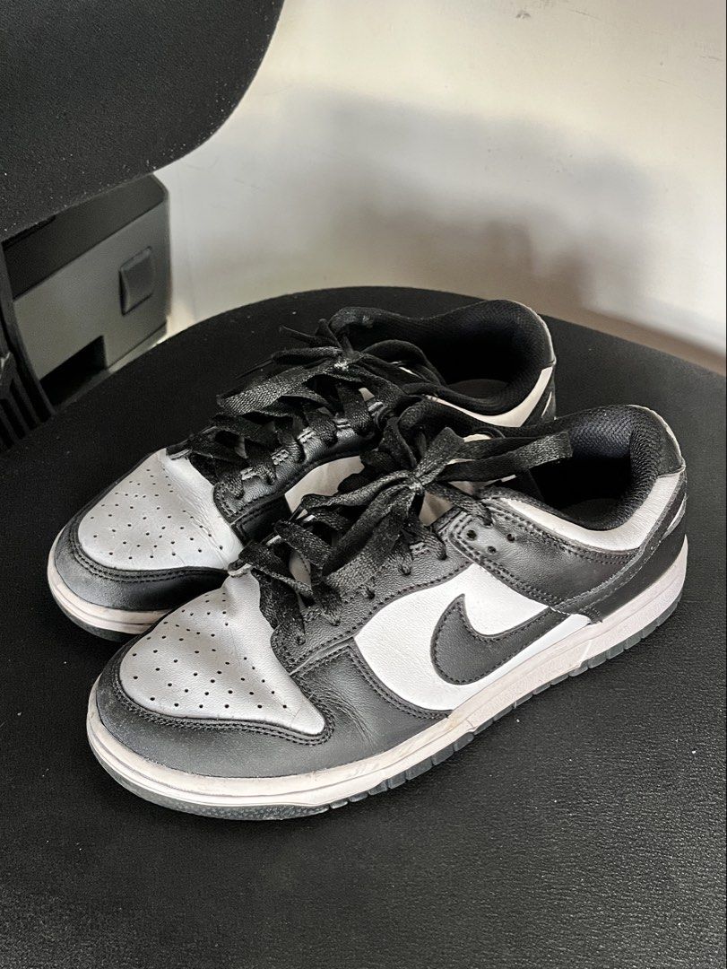 Original Nike Dunk Low Panda Black White Sneakers (Category: Sneakers) located in Manila. Submitted by declutwtlu_ (Listing ID 1467427381, Image 1). Description: - Brand/Model: Nike Dunk Low - Purchased in footlocker - Shoelaces are not original - Style: Iconic streetwear staple featuring a premium leather upper, toe box perforation, and flat black laces - Condition: Ready to wear with minor wear on sole edges and slight creasing on uppers from n