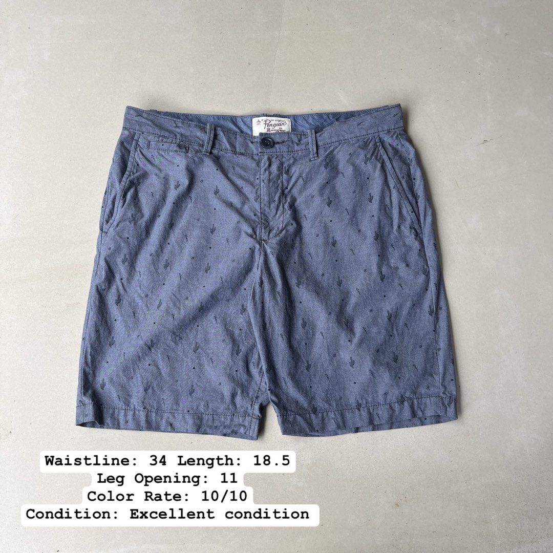 Original Penguin Munsingwear Cactus Pattern Shorts (Category: Shorts) located in Mandaue City. Submitted by chinsyap_03 (Listing ID 1467488339, Image 1). Description: - Brand: Original Penguin by Munsingwear - Style: Blue shorts with all-over cactus print - Size: US 33 (Waistline: 34 inches) - Dimensions: Length 18.5 inches, Leg opening 11 inches - Features: Button closure, zip fly, front and back pockets - Condition: Excellent overall condition 