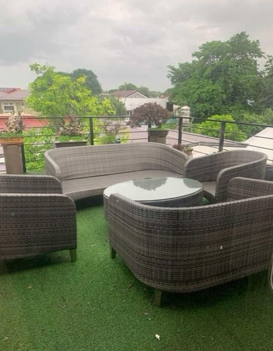 Outdoor Wicker Sofa and Table Set (Category: Outdoor Furniture) located in Pasig City. Submitted by cormatzu (Listing ID 1467421477, Image 1). Description: - Set includes: 2 sofas, 2 matching armchairs, and 1 glass-top coffee table - Material: Weather-resistant grey wicker, built for outdoor use - Ideal for: Patios, balconies, or rooftop gardens - Condition: Sturdy build and well-maintained.