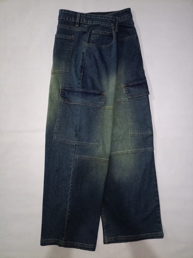 Oxygen Straight Fit Denim Jeans Size 34 (Category: Jeans) located in Caloocan City. Submitted by grandturtle-371b8d (Listing ID 1467397574, Image 2). Description: - Brand/Style: Oxygen straight fit denim jeans - Size: Tagged size 34 - Color/Wash: Dark blue with front thigh fading details - Features: Utility cargo pockets on the sides - Details: Clean stitching and classic button closure - Material: Sturdy and durable fabric construction.
