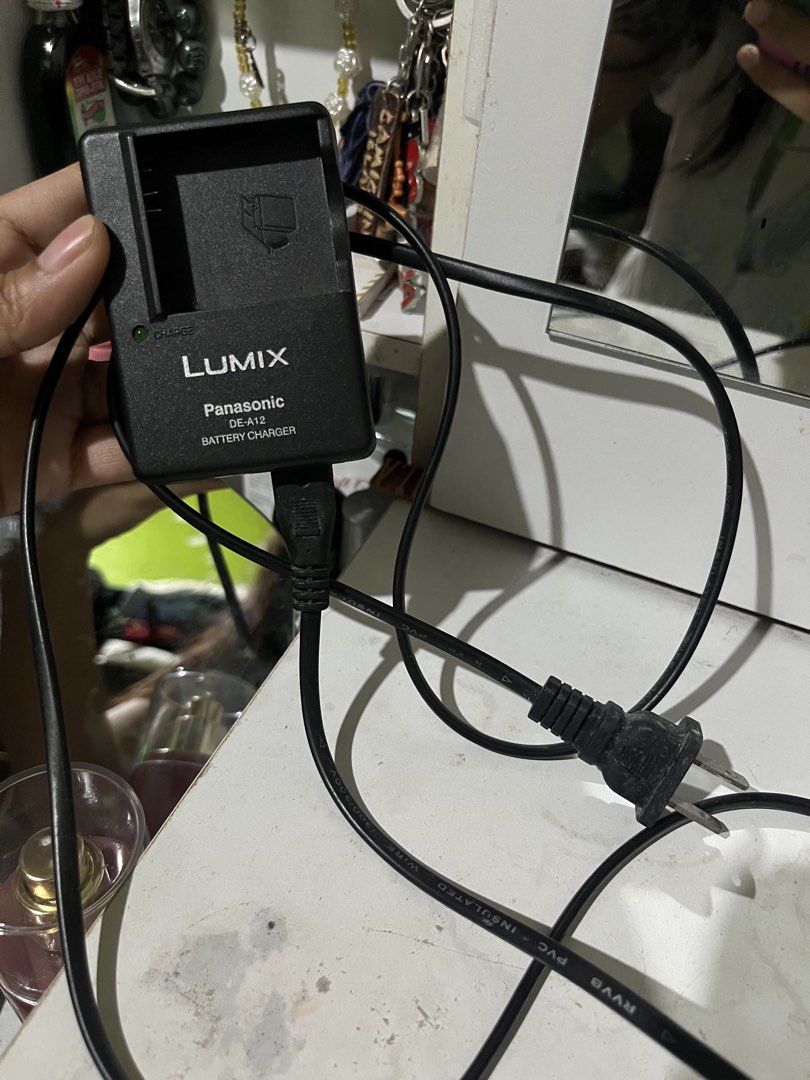 Panasonic lumix digicam charger (Category: Batteries & Chargers) located in Cebu City. Submitted by luv.vintage (Listing ID 1467544823, Image 3). Description: saglit lang po nagamit since sold na din yung camera.