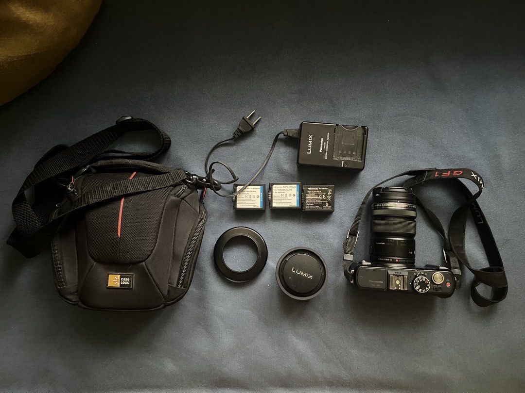 Panasonic Lumix DMC-GF1 Camera Bundle (Category: Cameras) located in Cebu City. Submitted by cluelessapple (Listing ID 1467522278, Image 2). Description: -Used as: school photography and personal use -Bought for 10k -Selling for 5k(negotiable) -Issue: LCD Burn and minor scratches(see last photo) -RFS: need funds Other inclusions: -3 batteries -Charger -Camera bag -Interchangeable-lens (0.2m/0.66ft) -Lens hood Note: -Lens cover for 0.35m/1.15ft is