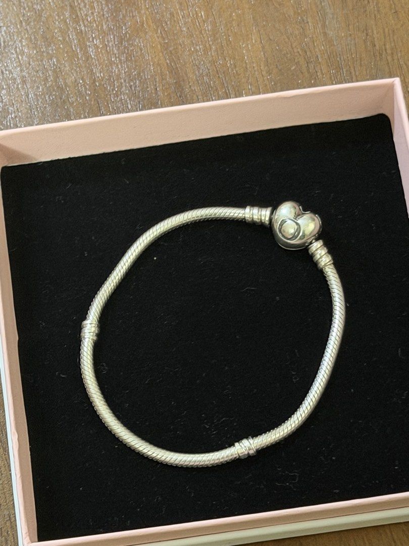 Pandora bangle and bracelet (Category: Bracelets) located in Manila. Submitted by thekcollection (Listing ID 1467443896, Image 1). Description: AUTHENTIC PRELOVED PANDORA! 🛍️🛒 Heart snake chain (18.5cm actual) - 2600 Pandora moments bangle (18cm actual) - 2400 No inclusions! All preloved. 100% money back if proven fake! Slightly negotiable. San Pedro, Laguna.