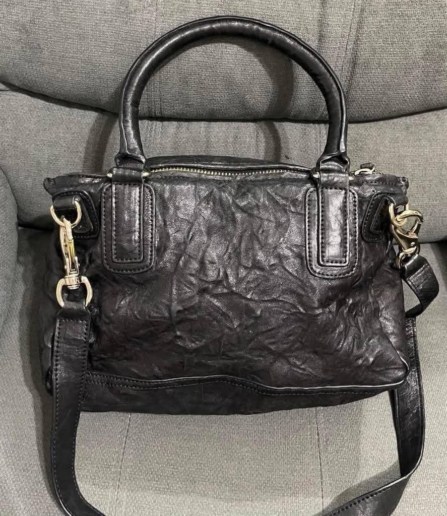Pandora Givenchy (Category: Shoulder Bags) located in Quezon City. Submitted by luxxechic (Listing ID 1467465505, Image 2). Description: coded ykk zip real leather with sling looks new no issue japan preloved actual photo posted mop: gcash.