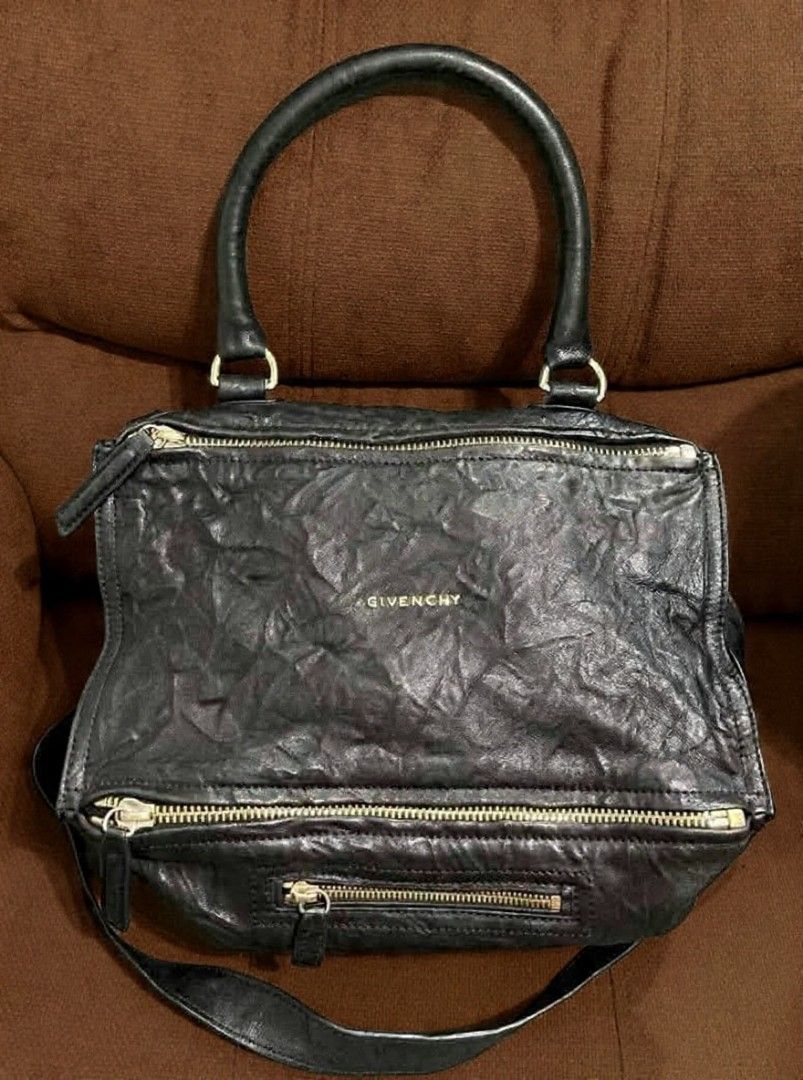 Pandora Givenchy (Category: Shoulder Bags) located in Quezon City. Submitted by luxxechic (Listing ID 1467465505, Image 1). Description: coded ykk zip real leather with sling looks new no issue japan preloved actual photo posted mop: gcash.