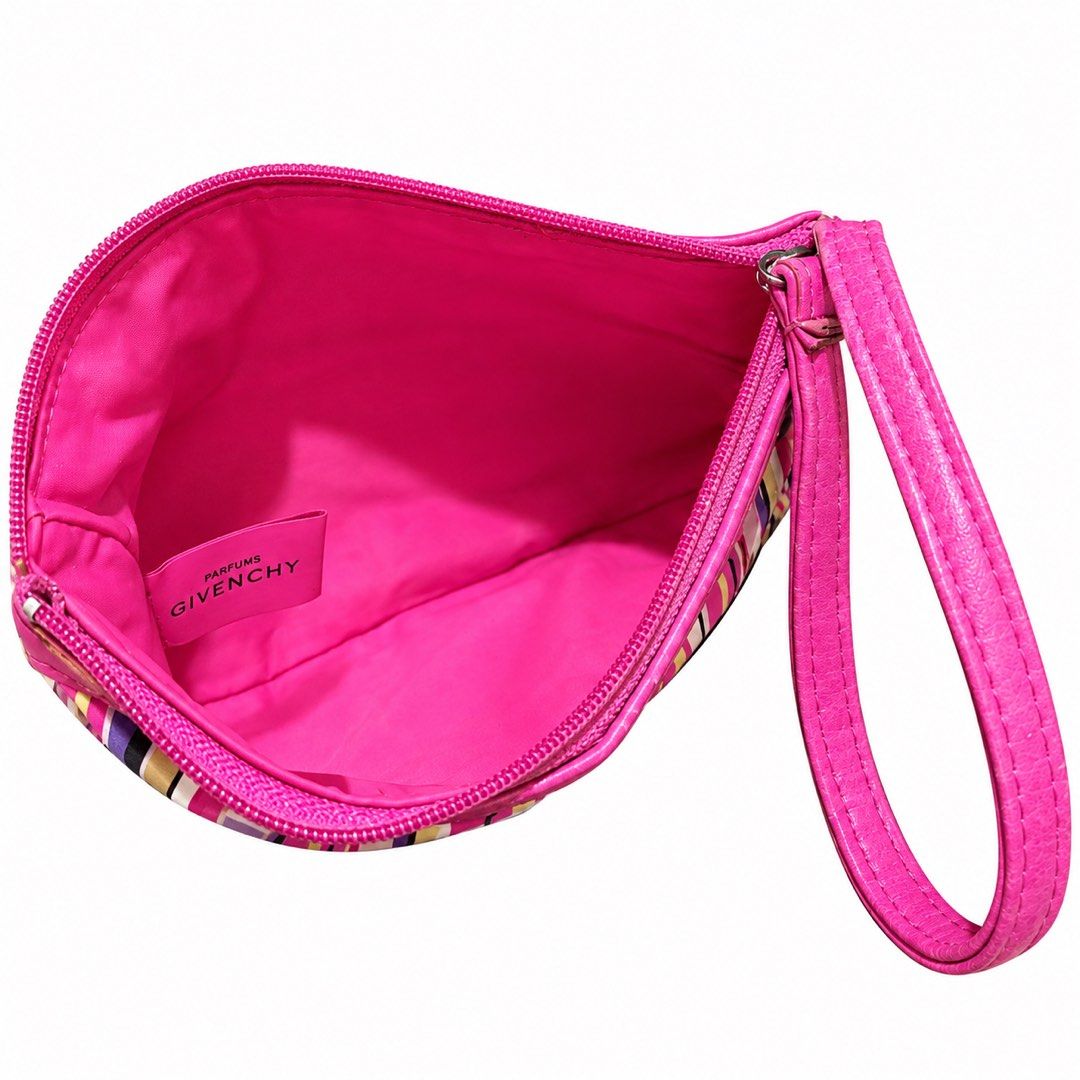 Parfums Givenchy Striped Wristlet Pouch (Category: Luxury Bags & Wallets) located in Carigara. Submitted by spark2503 (Listing ID 1467376411, Image 3). Description: - Brand: Parfums Givenchy - Design: Bright multi-color stripes with vibrant pink leather trim and wrist strap - Closure: Secure top zipper closure - Interior: Hot pink lining with branded fabric tag - Details: Front exterior debossed Givenchy logo patch - Condition: Good condition - P