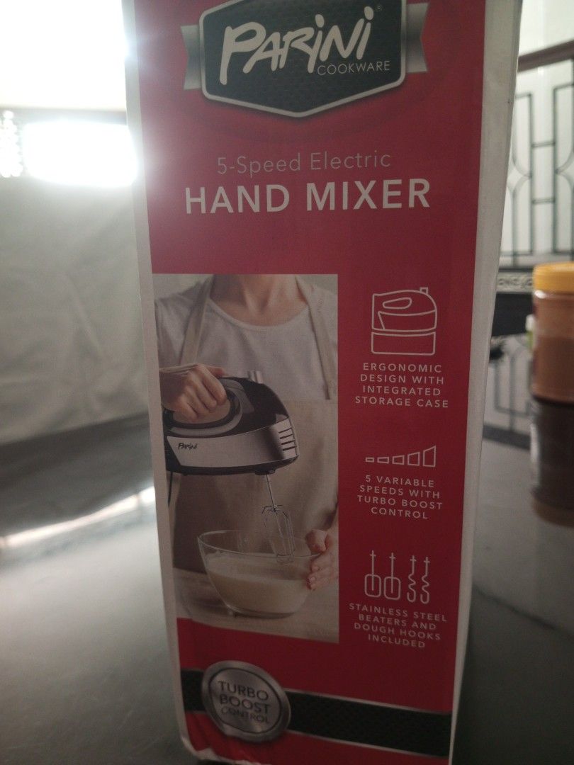 Parini 5-Speed Electric Hand Mixer 110volts (Category: Hand & Stand Mixers) located in Pasig City. Submitted by mark032 (Listing ID 1467367701, Image 2). Description: - Brand: Parini 5-Speed Electric Hand Mixer - Color: Stylish Black and Silver - Features: Ergonomic handle, turbo boost control, and one-touch eject button - Inclusions: Stainless steel beaters, dough hooks, whisk, and acrylic storage case - Perfect for: Mixing batters, whipping cre
