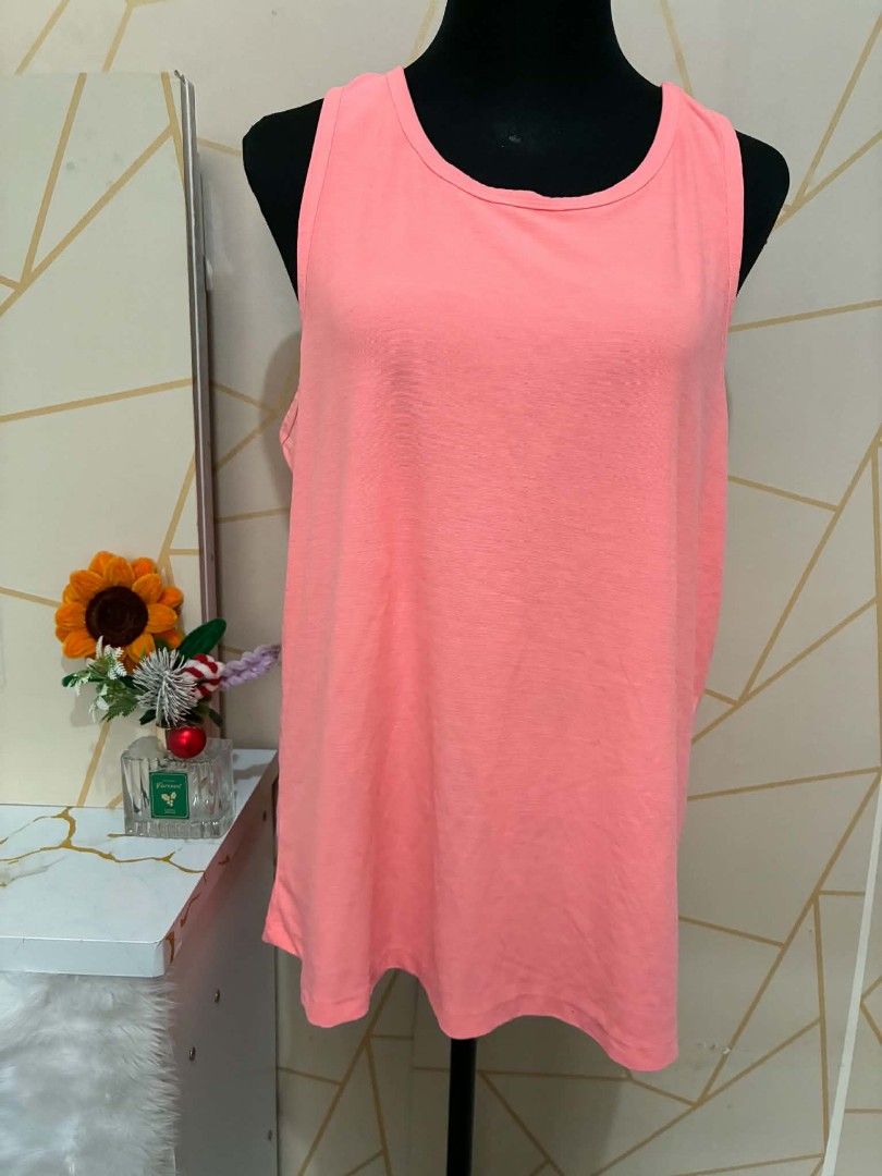 Peach Coral Active Tank Top- Large (Category: Activewear) located in Manila. Submitted by jollyann_b1990 (Listing ID 1467466056, Image 3). Description: 🔥 ACTIVEWEAR TOPS COLLECTION 🔥 > Pang gym, yoga, jogging o pang daily OOTD! > ✨ Drifit / Breathable / Presko suotin > 💪 Flattering fit - to Large > ✅ Ukay branded pero good as new! > > Mine now, pay tomorrow via GCash > 📍 Pasig > PM lang mga sis! #ActivewearPH #GymOutfitPH #WorkoutTop #DrifitT