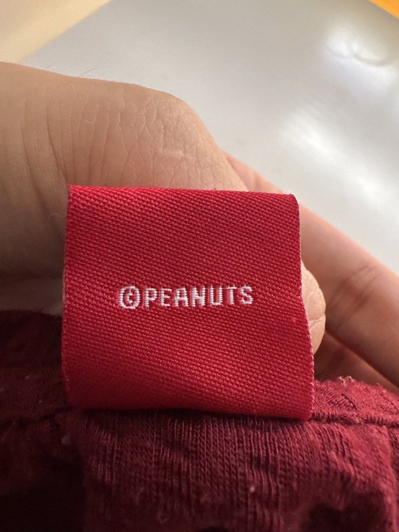 Peanuts Snoopy Maroon Ribbed T-Shirt Size S (Category: Shirts) located in Angeles City. Submitted by thala.1204.68 (Listing ID 1467383254, Image 2). Description: - Brand: Peanuts - Color: Maroon - Size: S - Material: Textured waffle knit / ribbed fabric - Design: Small embroidered gold Snoopy graphic on the chest - Details: Crew neck, short sleeves - Condition: Great casual basic.