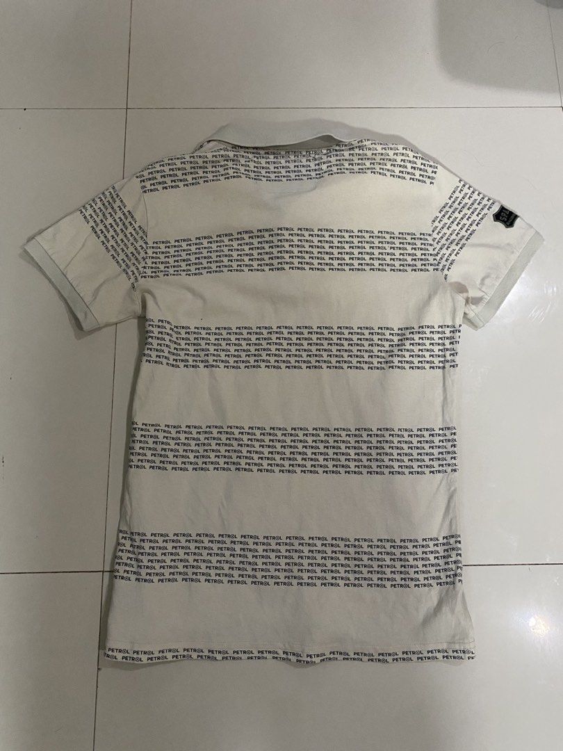 Petrol Industries Slim Fit Polo (Category: Tshirts & Polo Shirts ) located in Cebu City. Submitted by shredder365 (Listing ID 1467384909, Image 2). Description: Petrol Industries Slim Fit Polo Price: ₱450 Size: See tag / Slim Fit Color: Off-White / Cream Brand: Petrol Industries Selling my original Petrol Industries polo shirt, bought from the mall. Clean automotive/racing-inspired design with an all-over Petrol print and embroidered/patch detail
