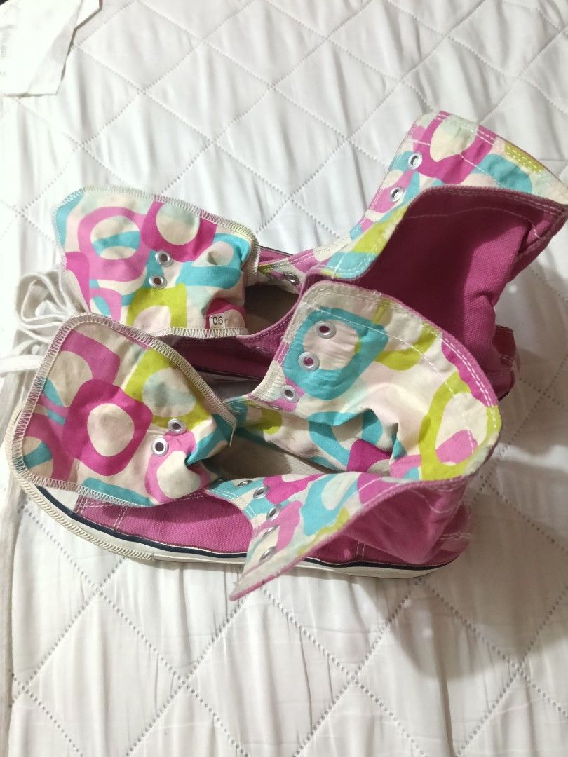 Pink High Top Canvas Sneakers (Category: Sneakers) located in Manila. Submitted by theresasebastian03 (Listing ID 1467496346, Image 3). Description: - Color: Pink with white laces and outsoles - Design: High-top canvas with playful camouflage print lining on fold-down collars - Condition: Pre-loved with characteristic scuff marks on cream rubber toe caps - Style: Casual everyday shoes - Inclusion: Comes with original laces.