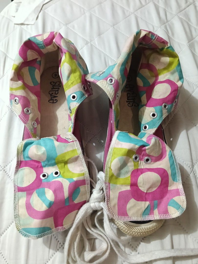 Pink High Top Canvas Sneakers (Category: Sneakers) located in Manila. Submitted by theresasebastian03 (Listing ID 1467496346, Image 2). Description: - Color: Pink with white laces and outsoles - Design: High-top canvas with playful camouflage print lining on fold-down collars - Condition: Pre-loved with characteristic scuff marks on cream rubber toe caps - Style: Casual everyday shoes - Inclusion: Comes with original laces.