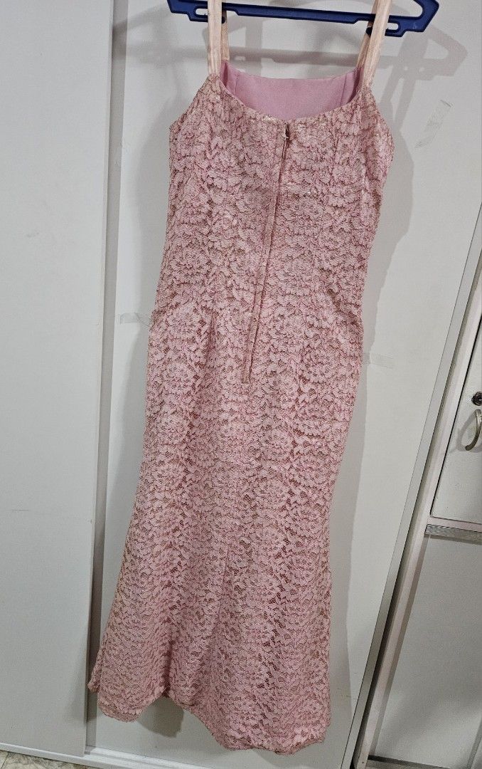 Pink Lace Spaghetti Strap gown (Category: Evening dresses & gowns) located in Caloocan City. Submitted by rm.diaz (Listing ID 1467422704, Image 2). Description: - Elegant pink lace maxi dress with light pink inner lining - Chic square neckline and delicate thin satin straps - Fitted silhouette with a slight flare at the hem - Convenient back zipper closure - Full-length gown ideal for formal events, weddings, and parties - Condition: Brand new / 