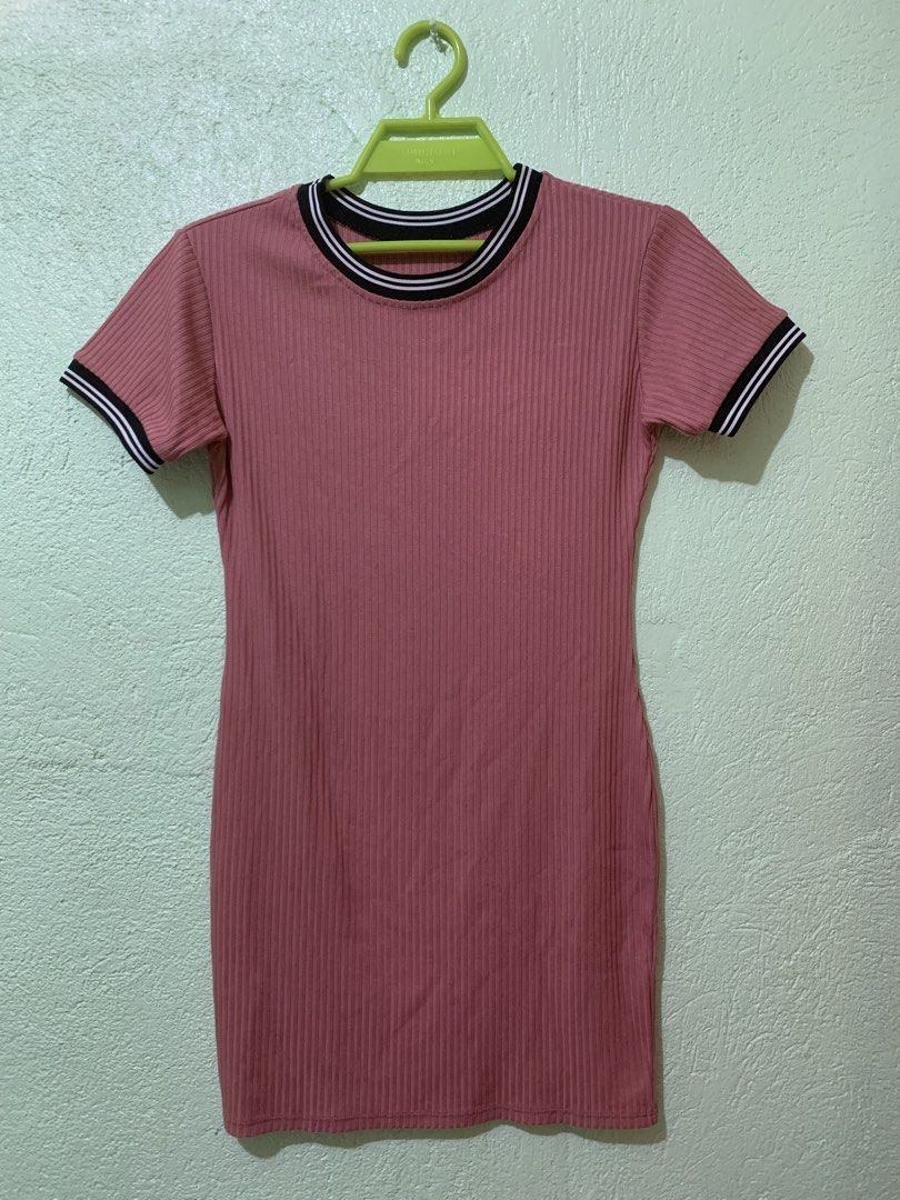 Pink ribbed ringer bodycon dress (Category: Dresses) located in Camalig. Submitted by ryrilim (Listing ID 1467373408, Image 2). Description: This is a pink ribbed ringer bodycon dress with short sleeves and black-and-white striped trim on the crew neckline and sleeve cuffs..