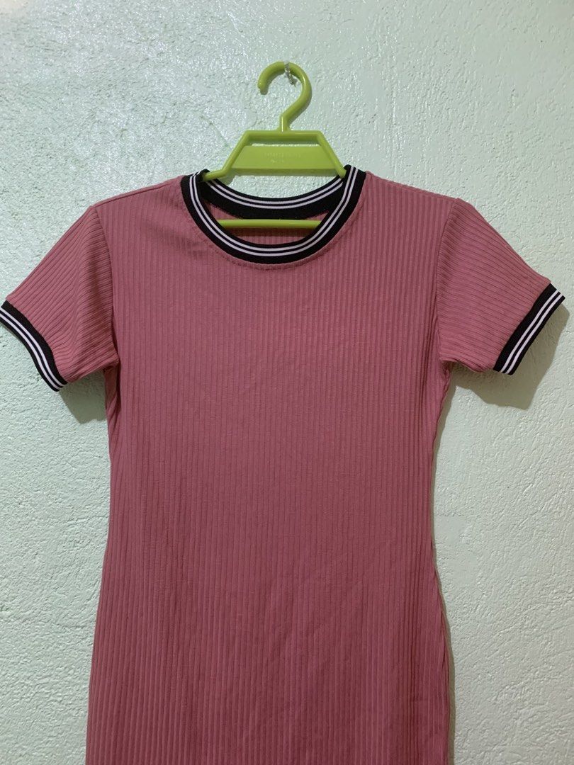 Pink ribbed ringer bodycon dress (Category: Dresses) located in Camalig. Submitted by ryrilim (Listing ID 1467373408, Image 3). Description: This is a pink ribbed ringer bodycon dress with short sleeves and black-and-white striped trim on the crew neckline and sleeve cuffs..
