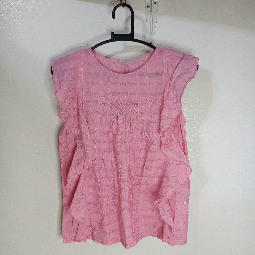Pink Ruffle Sleeveless Blouse (Category: Sleeveless) located in Santa Maria. Submitted by abclosetph (Listing ID 1467423429, Image 1). Description: medida size! bust: 28-30 length: 22 - color may vary due to lighting - manage your expectations, these are preloved items..