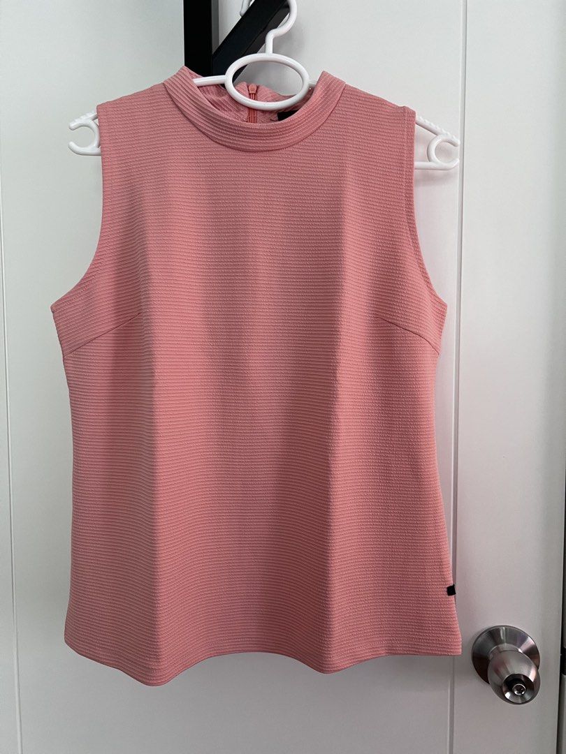 Pink Sleeveless (Category: Blouses) located in Muntinlupa City. Submitted by thriftpandamnl (Listing ID 1467524708, Image 1). Description: Size: Medium Pick-up: Brgy Sucat, Muntinlupa City Delivery via Lalamove, J&T, Flash.