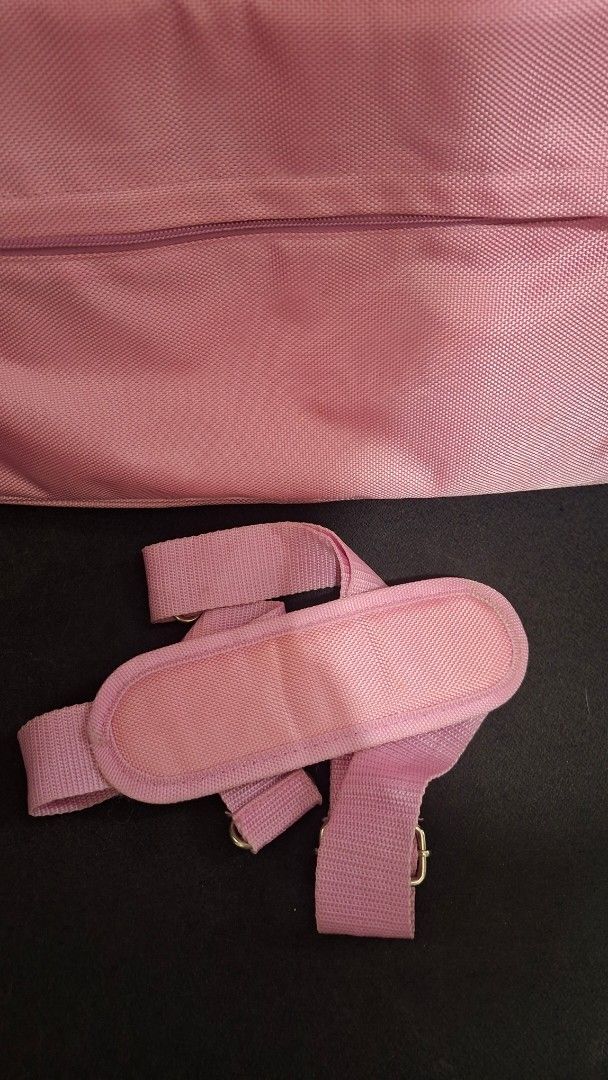 Pink Vaio Laptop Bag with Shoulder Strap (Category: Laptop Bags & Sleeves) located in Marikina City. Submitted by makimki (Listing ID 1467399657, Image 2). Description: - Bright pink Vaio laptop bag, ideal for daily use and on-the-go tech carriers - Made from durable fabric with a secure Velcro laptop sleeve inside the main compartment - Includes a matching shoulder strap with a padded cushion for all-day comfort - Features multiple inner compart