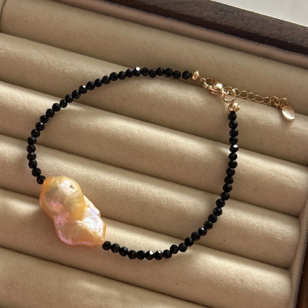 Pinkish peach baroque pearl (Category: Bracelets) located in Lipa City. Submitted by avenueusco_ph (Listing ID 1467412440, Image 2). Description: A statement bracelet featuring our pinkish peach baroque pearl and a black tourmaline 🍑🖤 2.8mm black tourmaline 14.6 mmx 26mm baroque Nice luster 8” long.
