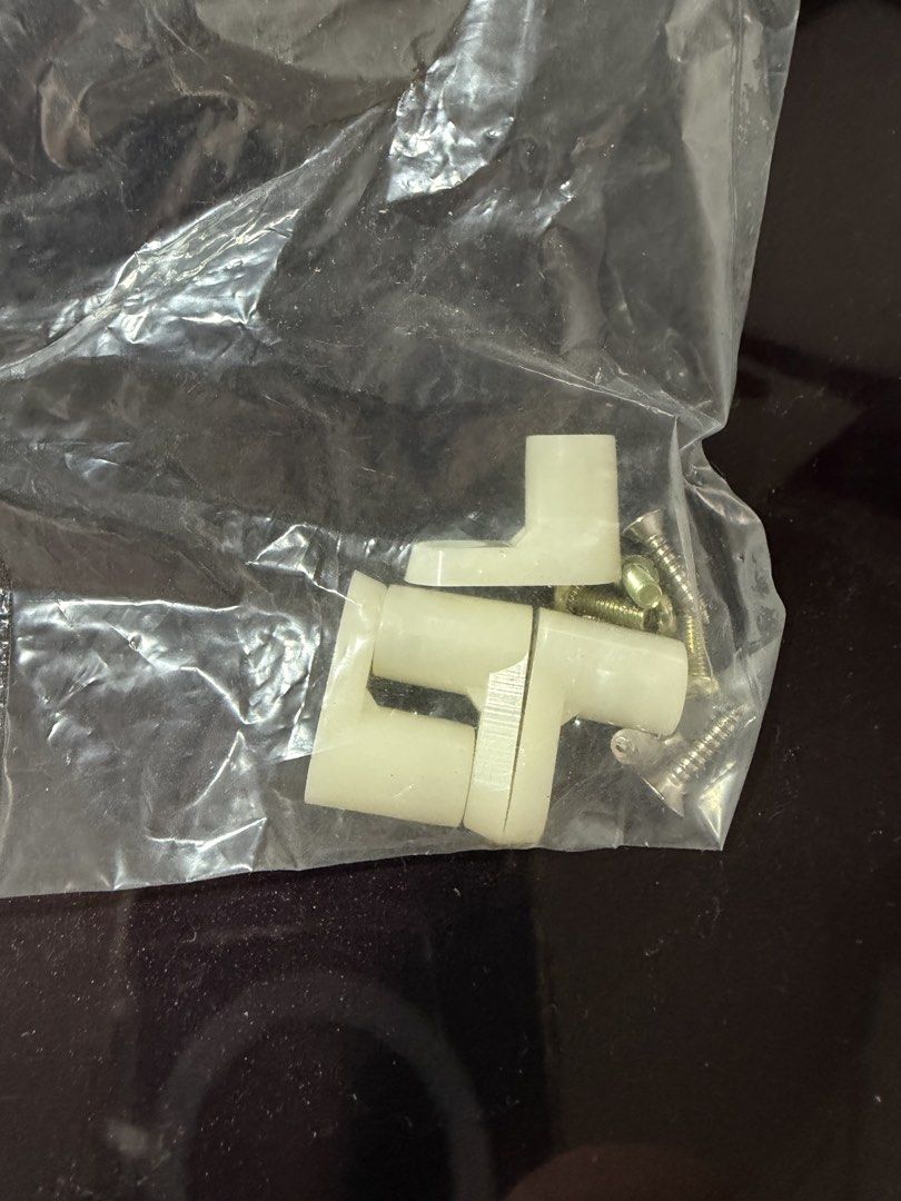 Plastic Mounting Clips and Screws Hardware Bulk Bag (Category: Construction & Building Materials) located in Quezon City. Submitted by ramonstuff (Listing ID 1467366054, Image 2). Description: - Product: White plastic corner mounting brackets with matching screws. Board stand offs. PCB mounting feet. 100 sets of 4 pieces per bag - Condition: Brand new, excess workshop supplies - Quantity: Lots of pieces included in a clear plastic bag - Ideal For
