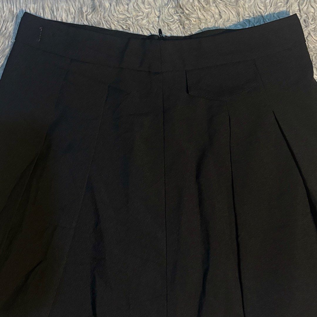 Pleated skirt (Category: Skirts) located in Mandaluyong City. Submitted by cinnamonstreet.ph (Listing ID 1467405985, Image 2). Description: Fit 26-27 With inner shorts Please check photos for reference Note: No when worn, too small for me Location: Mandaluyong MOP: Maya Delivery: Grab or Lalamove #Bershka #Zara #Mango #HM #Pullandbear.
