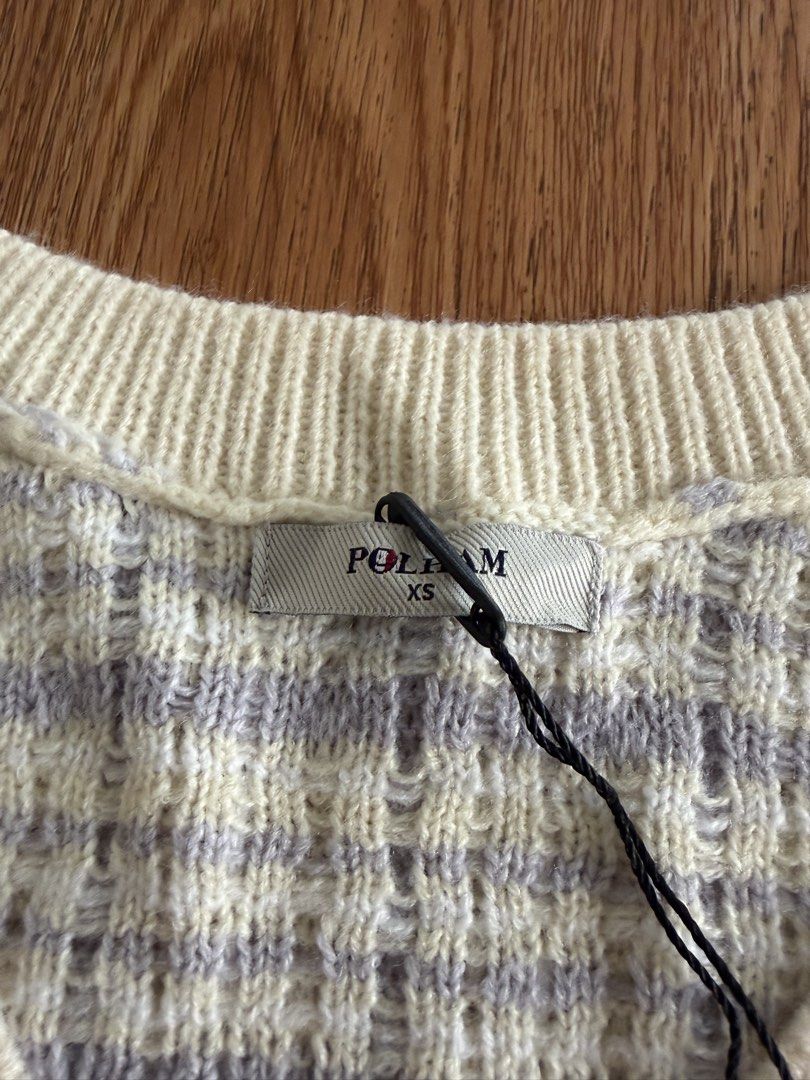 Polham Knit V-Neck Sweater Vest (Category: Others Tops) located in Quezon City. Submitted by morgan_rysblk (Listing ID 1467366479, Image 3). Description: - Brand: Polham - Condition: Brand new with original store tag attached .