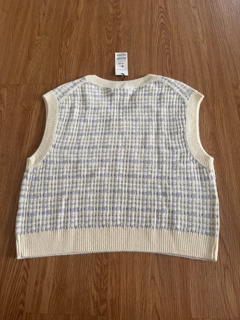 Polham Knit V-Neck Sweater Vest (Category: Others Tops) located in Quezon City. Submitted by morgan_rysblk (Listing ID 1467366479, Image 2). Description: - Brand: Polham - Condition: Brand new with original store tag attached .
