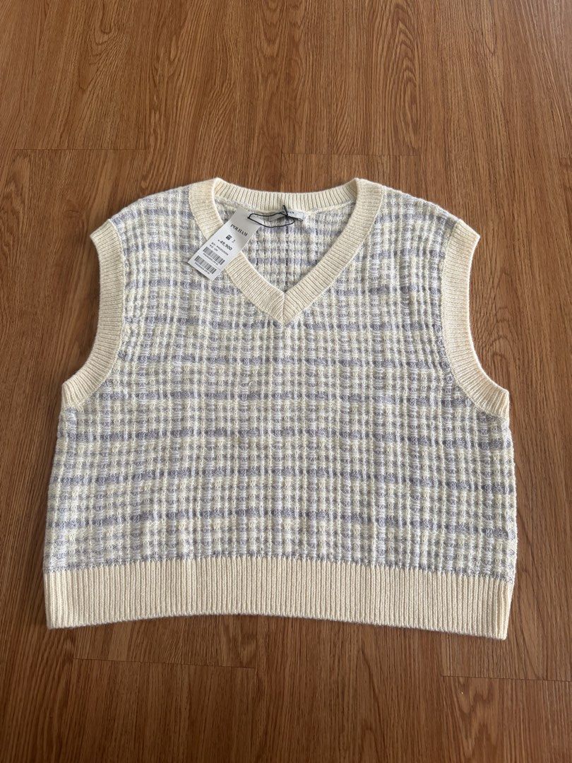 Polham Knit V-Neck Sweater Vest (Category: Others Tops) located in Quezon City. Submitted by morgan_rysblk (Listing ID 1467366479, Image 1). Description: - Brand: Polham - Condition: Brand new with original store tag attached .
