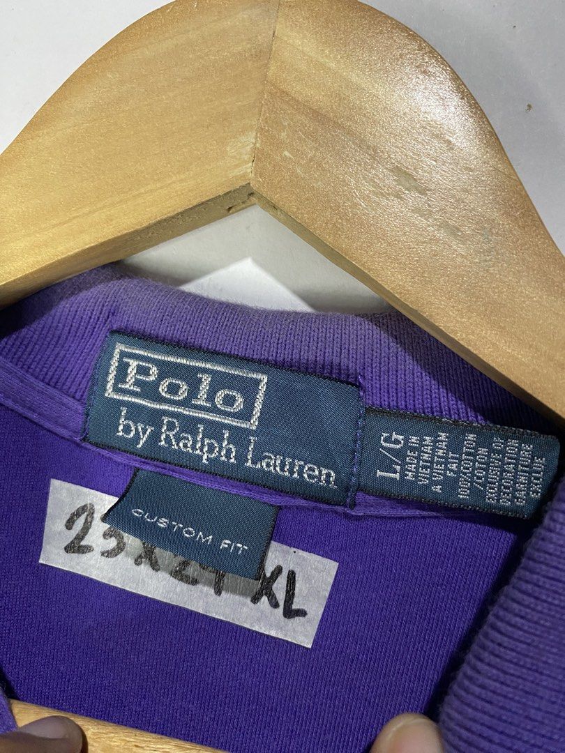 POLOSHIRT (Category: Tshirts & Polo Shirts ) located in Jaen. Submitted by oshimamark58418 (Listing ID 1467517801, Image 3). Description: - Brand: Polo by Ralph Lauren - Color: Purple with green embroidered pony logo - Size: Custom Fit, L/G (fits like XL, actual measurement 23x29 inches) - Material: 100% Cotton, breathable and comfortable - Condition: Excellent pre-loved condition - Perfect for smart-casual outfits, work, or daily wear.