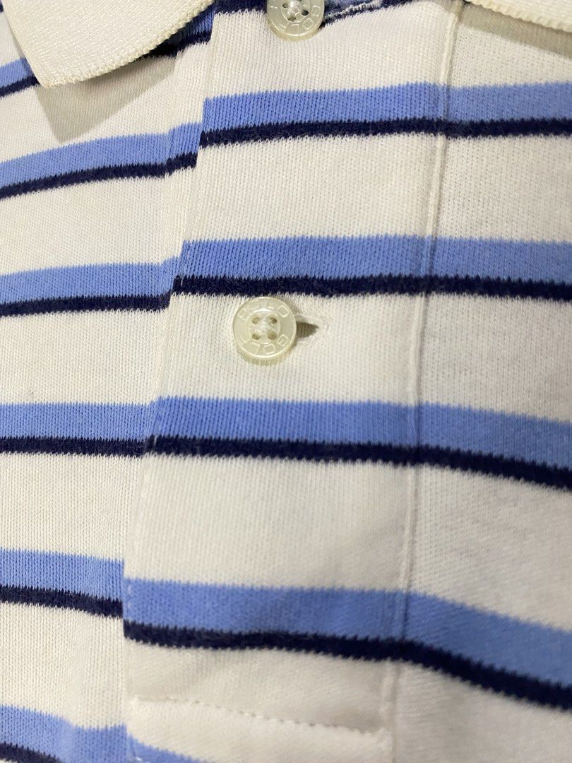 POLOSHIRT (Category: Tshirts & Polo Shirts ) located in Jaen. Submitted by oshimamark58418 (Listing ID 1467518442, Image 3). Description: - Brand: Polo by Ralph Lauren - Design: Blue and navy horizontal stripes on white background with embroidered pony logo - Tag Size: S (Actual measurement: 21 inches width x 28 inches length, fits like Large) - Details: Classic polo collar, multi-button placket, branded buttons - Origin: Made in Sri Lanka - Cond