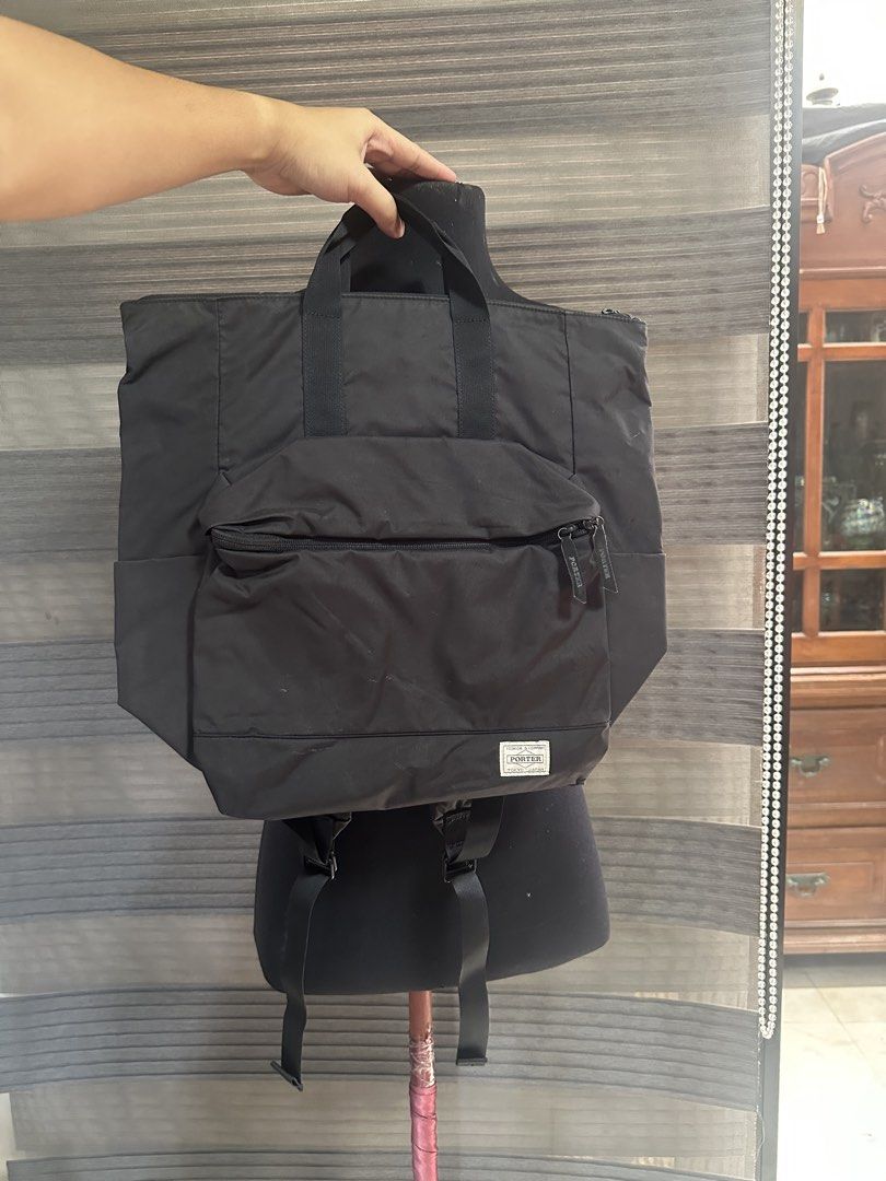 Porter Tokyo Japan Black Tote Backpack (Category: Backpacks) located in Quezon City. Submitted by prelovedbagsbygiv (Listing ID 1467470534, Image 1). Description: - Brand: Porter Tokyo Japan - Style: 2-in-1 Hybrid Backpack & Tote bag - Color: Classic Black - Material: Durable, high-quality nylon - Features: Top carry handles, adjustable shoulder straps, and a large front zippered pocket with dual pullers - Branding: Iconic Porter brand patch at t