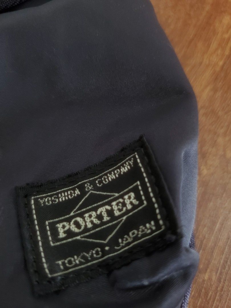 Porter Yoshida & Co. Shoulder Bag (Category: Sling Bags) located in Manila. Submitted by royalrabbit.7b2a11 (Listing ID 1467396732, Image 2). Description: - Brand: Porter Yoshida & Co. (Made in Japan) - Color: Dark Navy - Material: Lightweight, durable nylon - Closure: Flap with snap button - Strap: Adjustable for custom fit - Authenticity: Genuine piece from the Japan Luggage Association - Condition: Clean inside and out, excellent pre-loved con