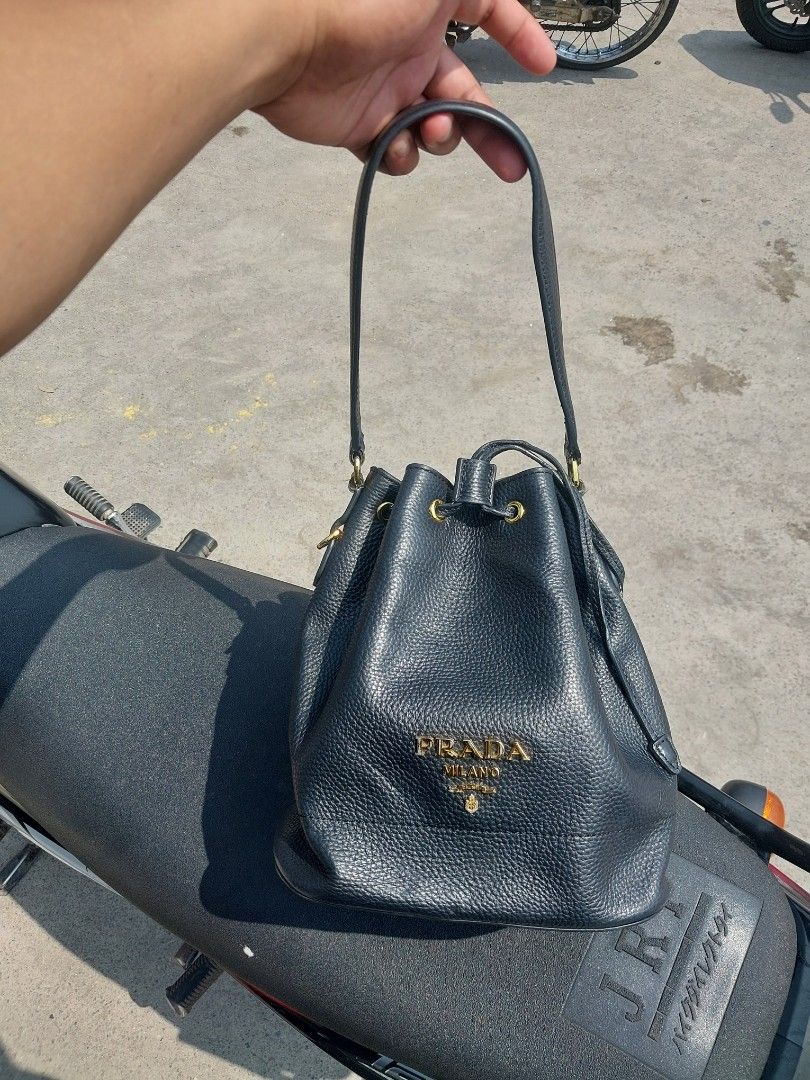 Prada black grainy leather bucket bag (Category: Luxury Bags & Wallets) located in Polomolok. Submitted by warmfire.3185dd (Listing ID 1467400519, Image 1). Description: .